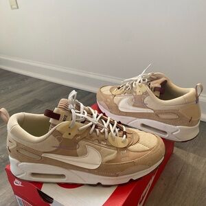 Nike beige and cream Air Max sneakers with maroon accents